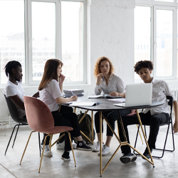 Employee discussing the project network planning services